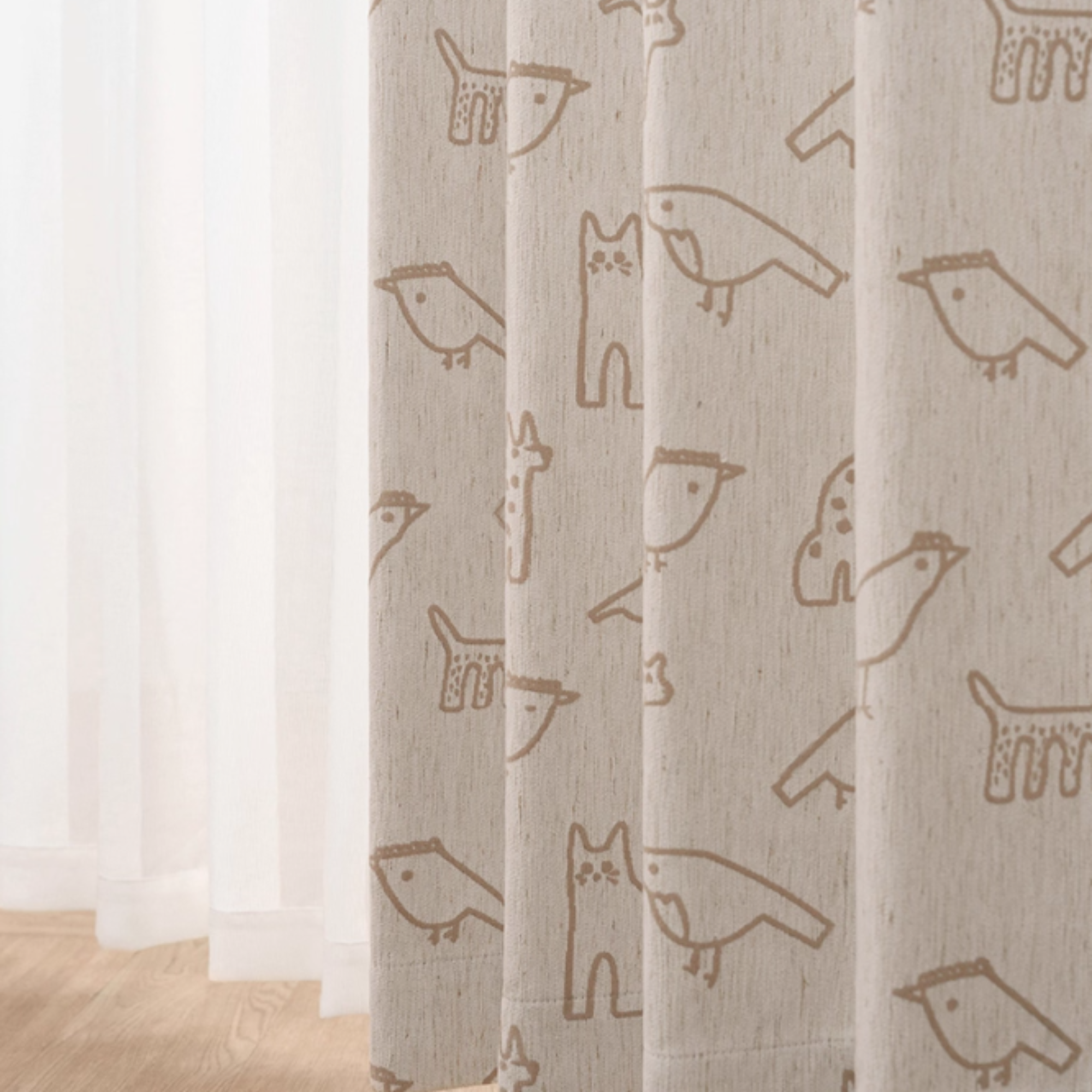 Kids curtains with animal pattern in a room setting