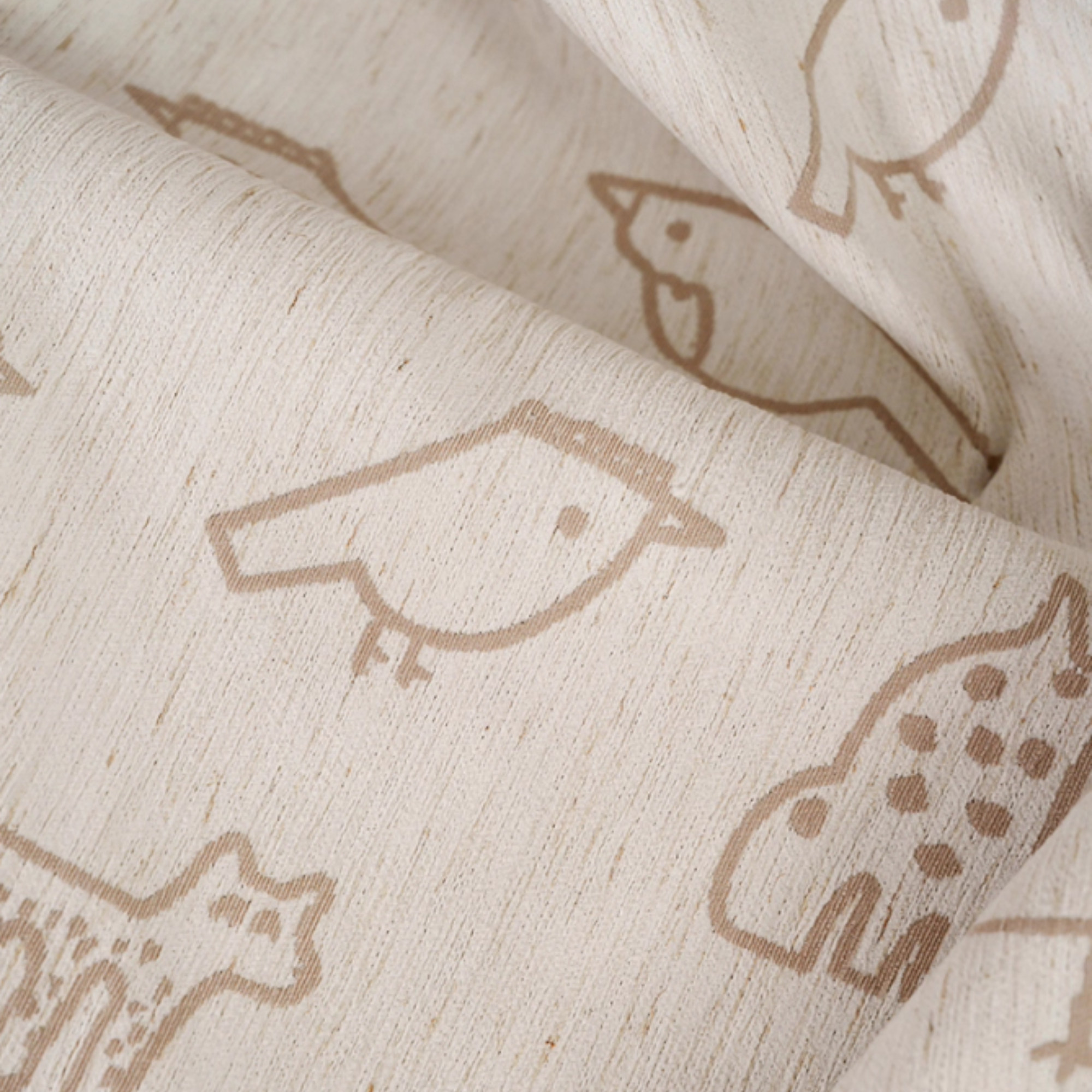 animal doodle patterns on beige curtain fabric