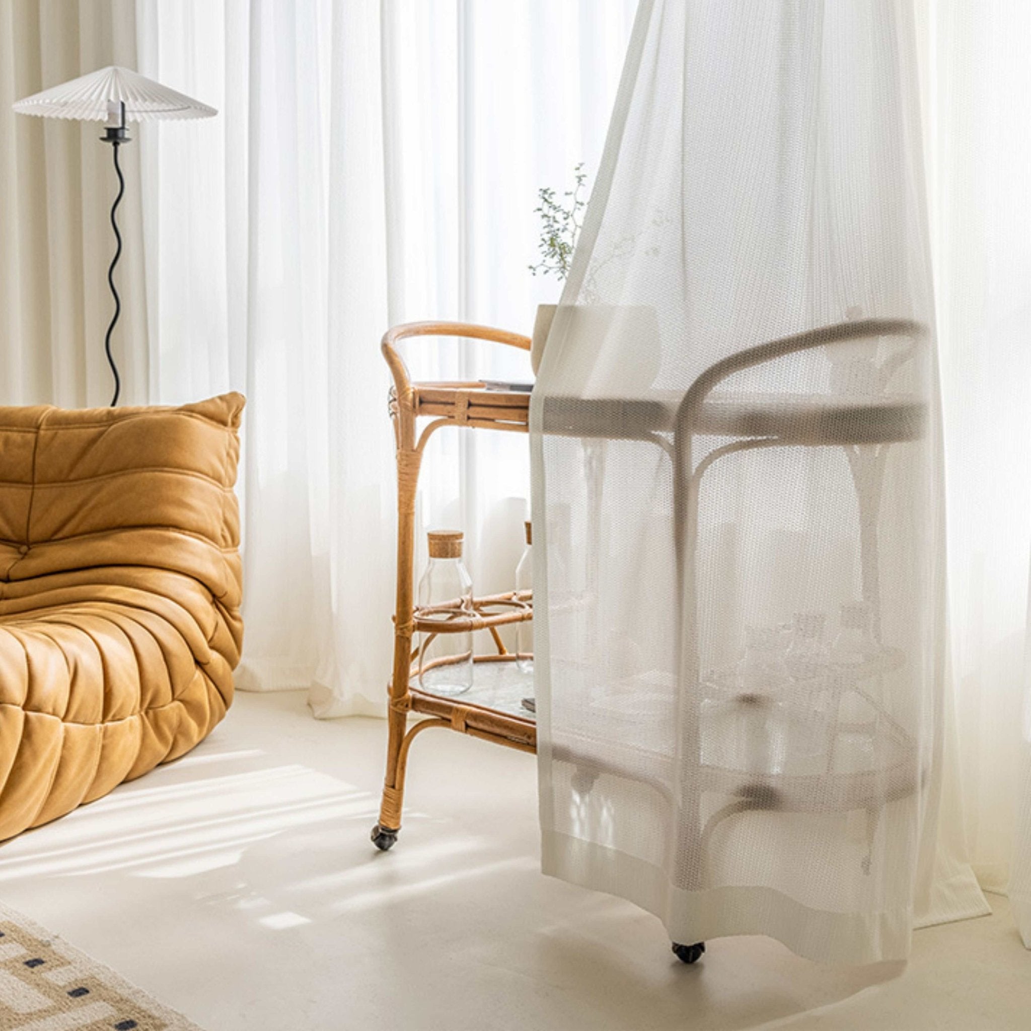 Lumos white sheer cat-proof curtains, recommended by cat owners for their durability and design.