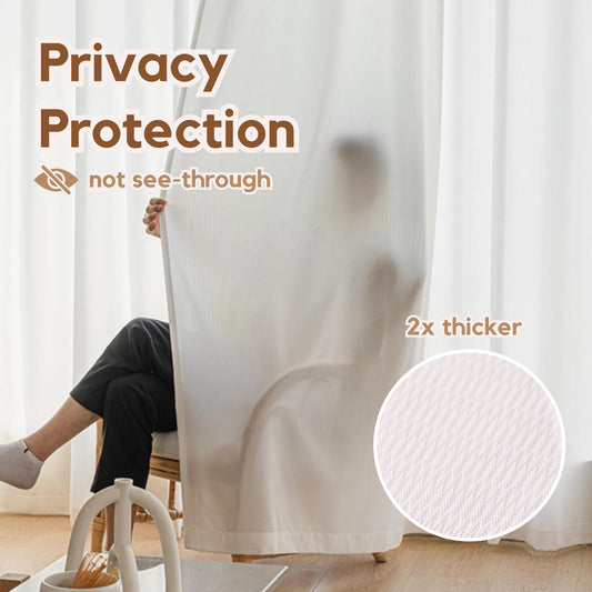 The privacy sheer curtains effectively conceal a person sitting behind them.