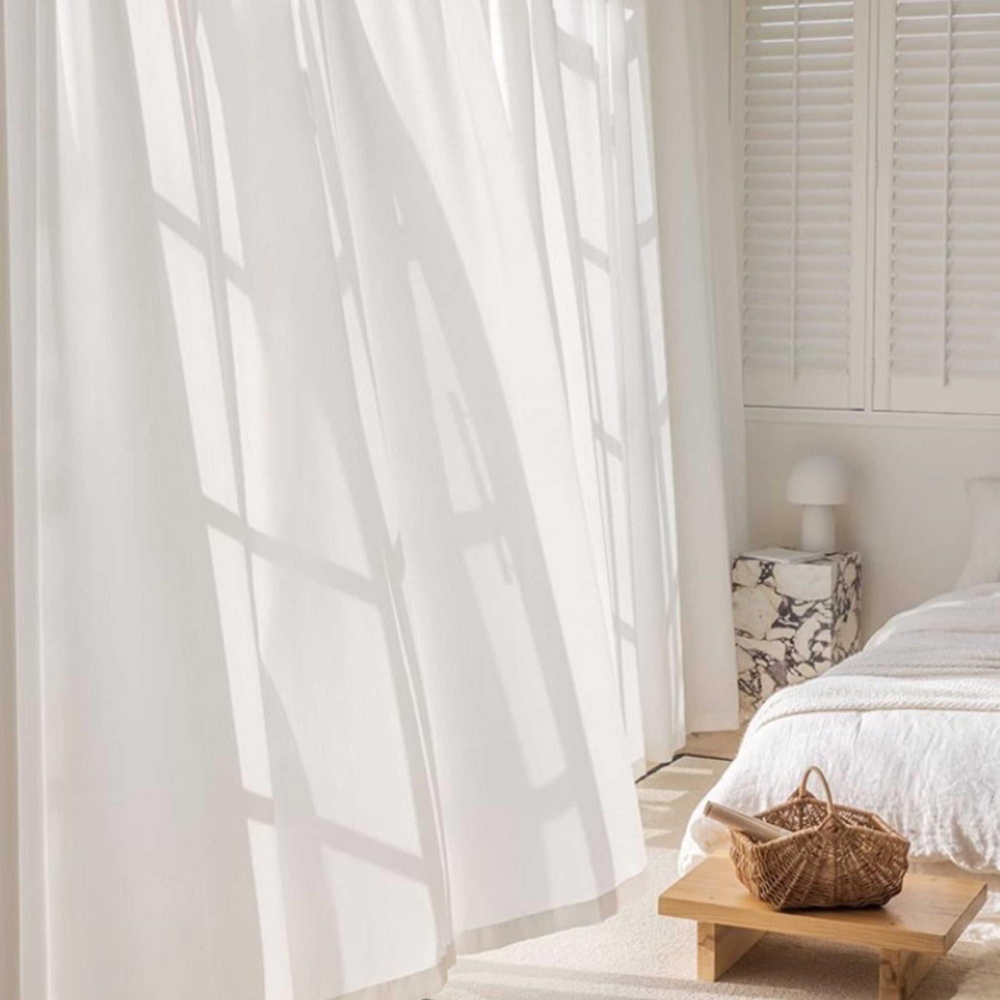 Cloud Privacy Semi-Sheer Curtains in bedroom letting light through while providing privacy