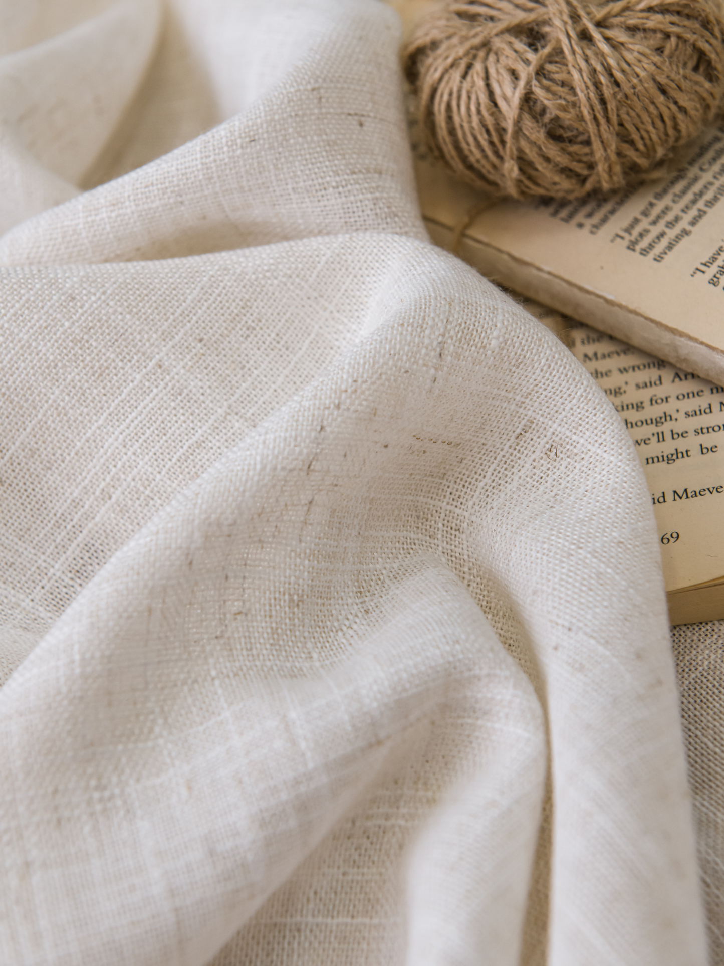 Close-up of the intricate weave of a linen sheer curtain