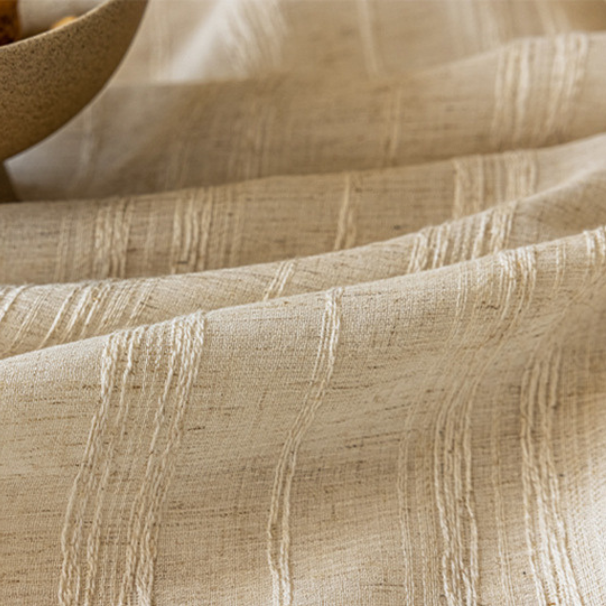 close up of the woven striped linen sheer fabric