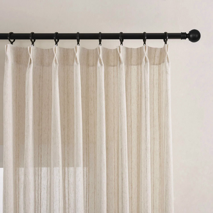 woven striped linen sheer curtains with pinch pleated heading style on a black curtain rod