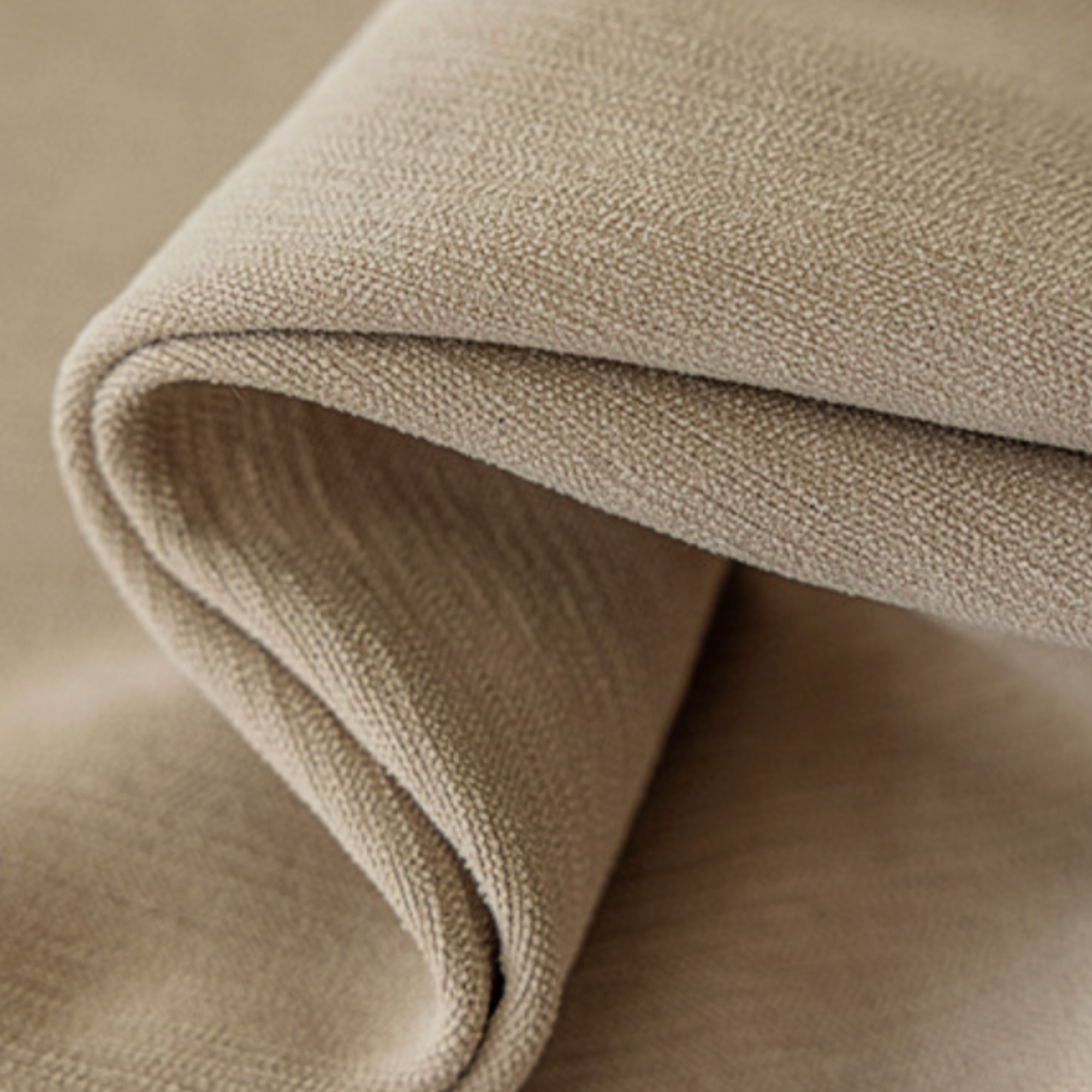 Close-up of beige fabric with a textured surface